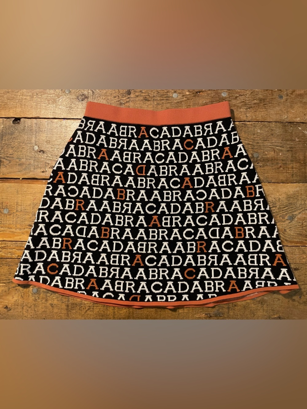 Anthropologie Black, White & Orange Abracadabra Knit Mini Skirt